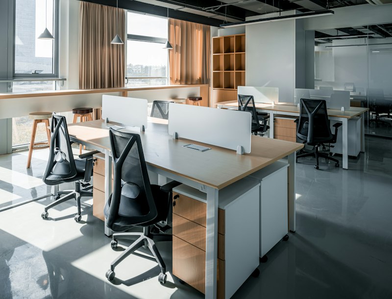 Office with wood-top workstations, pedestals and filing shelves